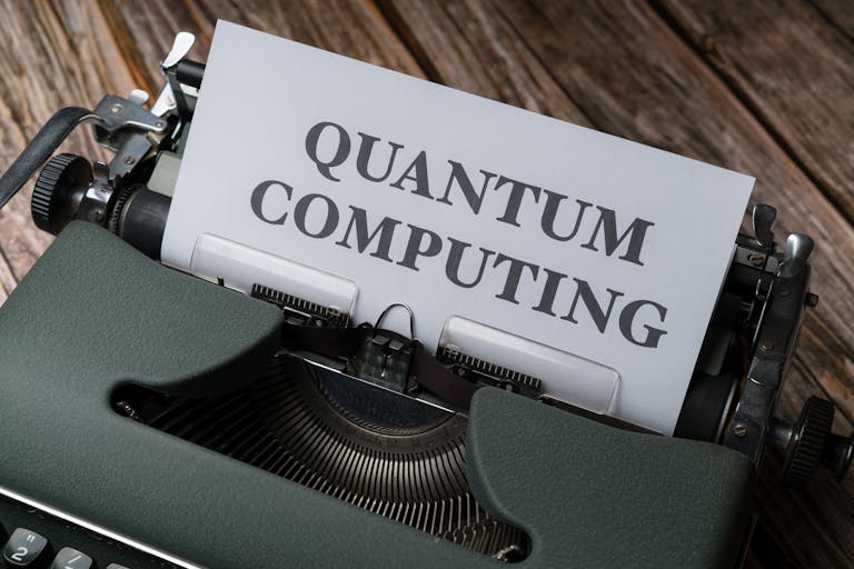 Quantum computing concept displayed on a vintage typewriter on wooden table.